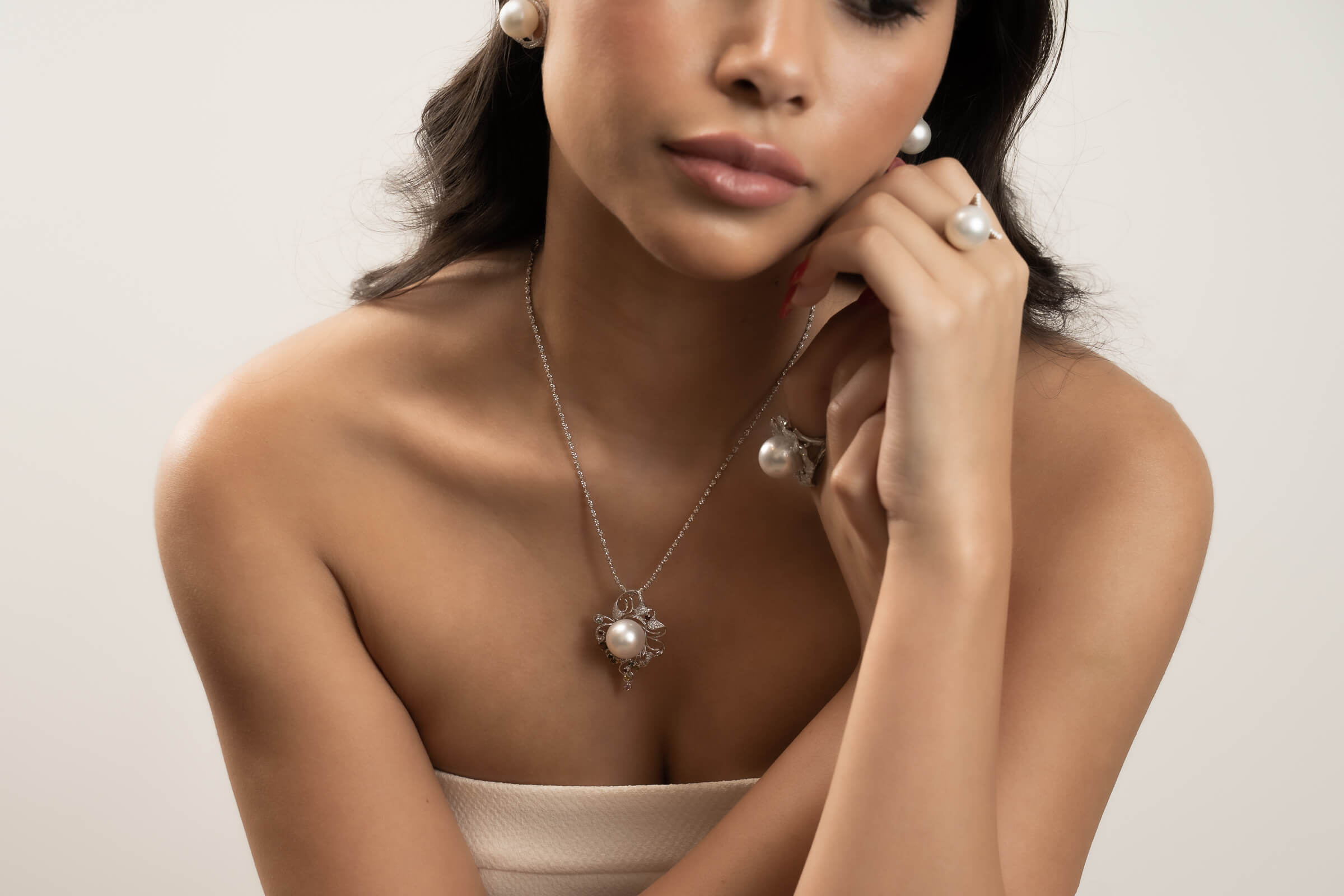 Women wearing pearl jewellery